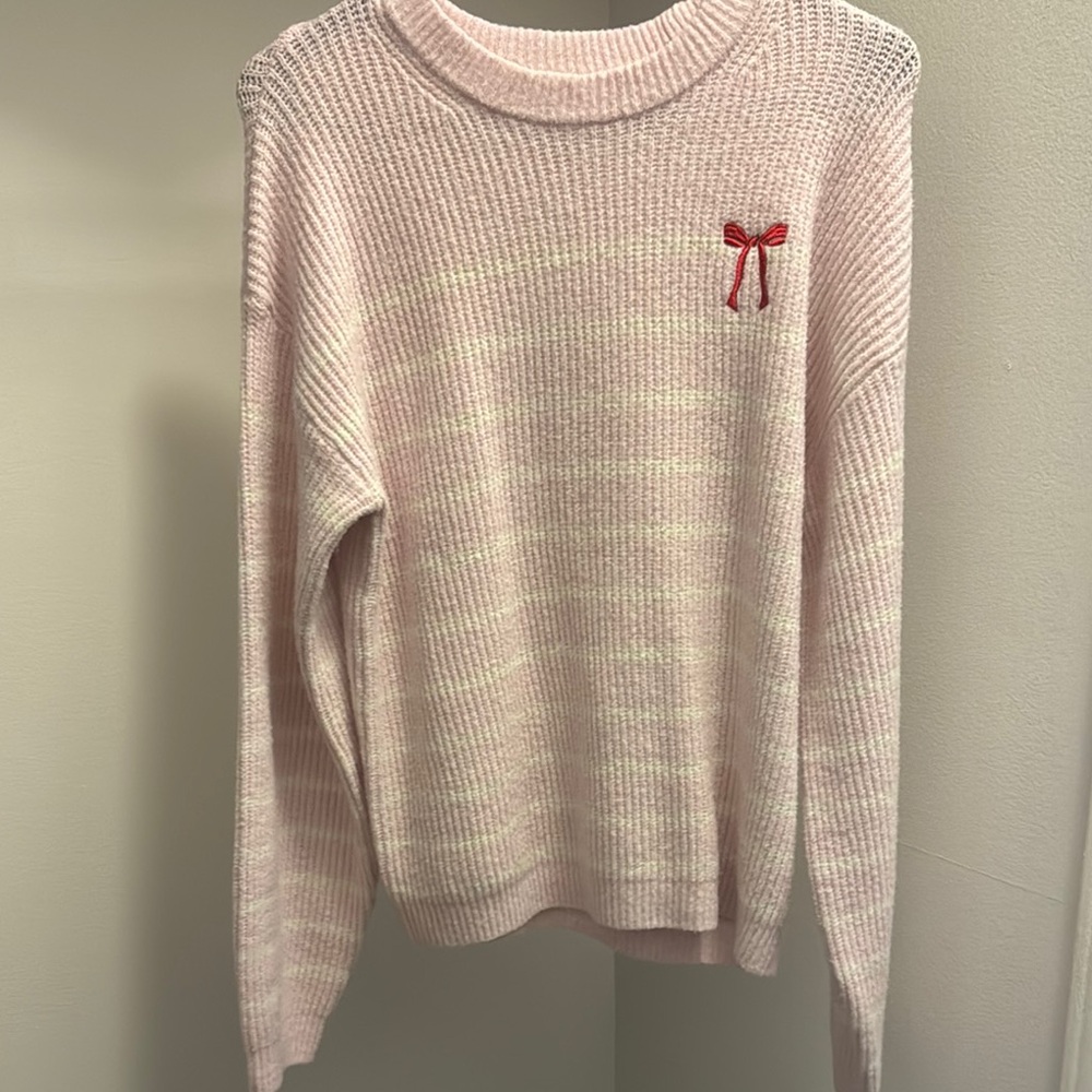 Pink Sweater with Red Bow Accent
